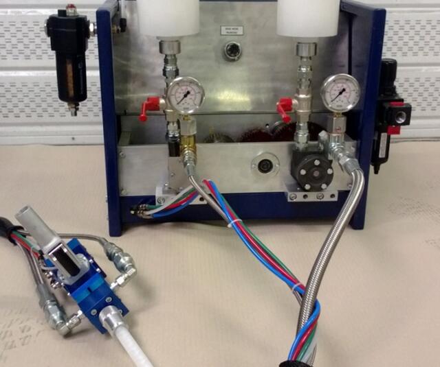 E50 with gravity pot E50 with gravity pot